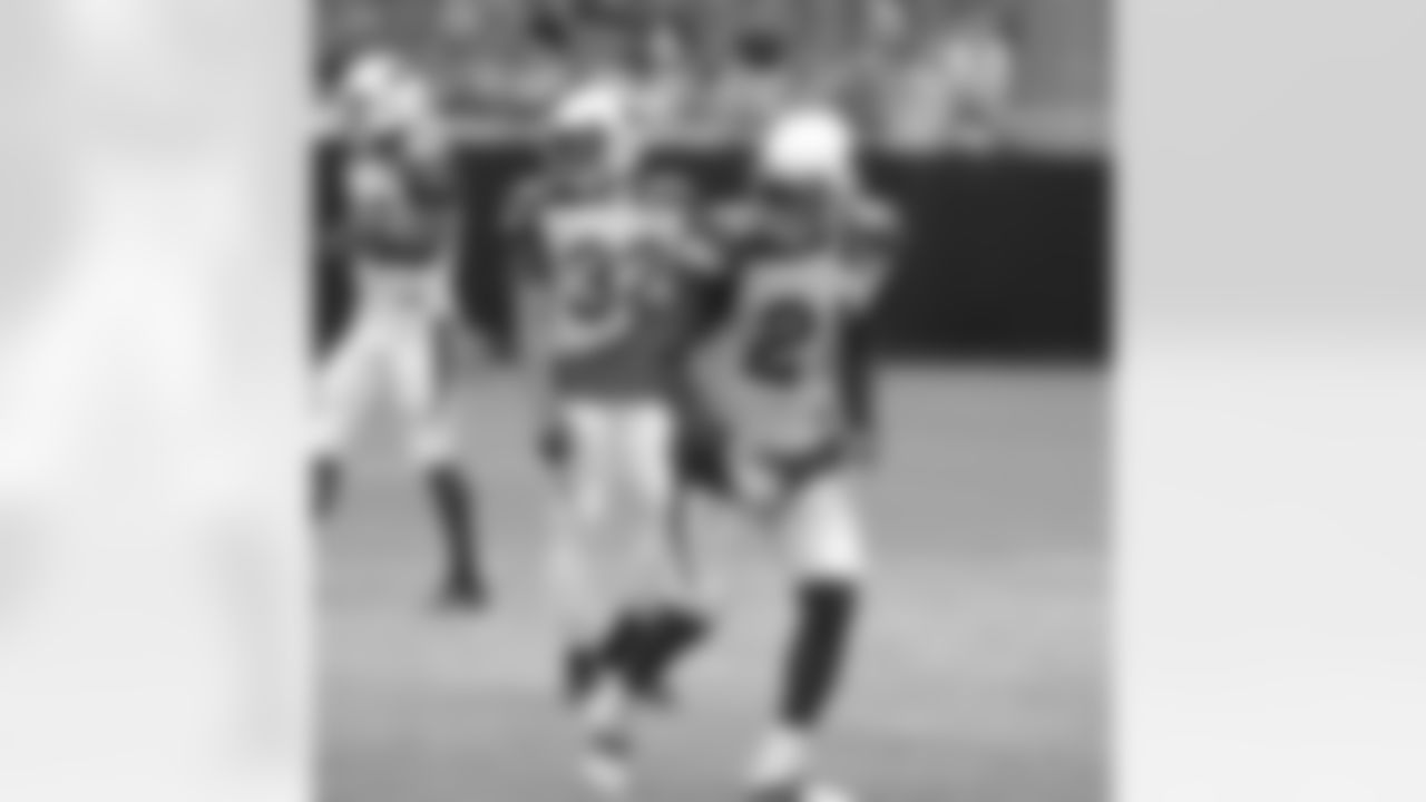 Secondary mates Tyrann Mathieu (32) and Patrick Peterson (21)
