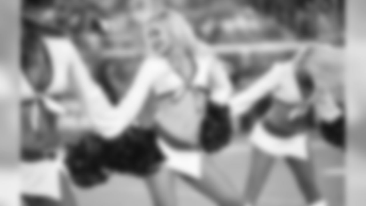 Images of the Cardinals cheerleaders during the first half of the preseason opener against the Chargers