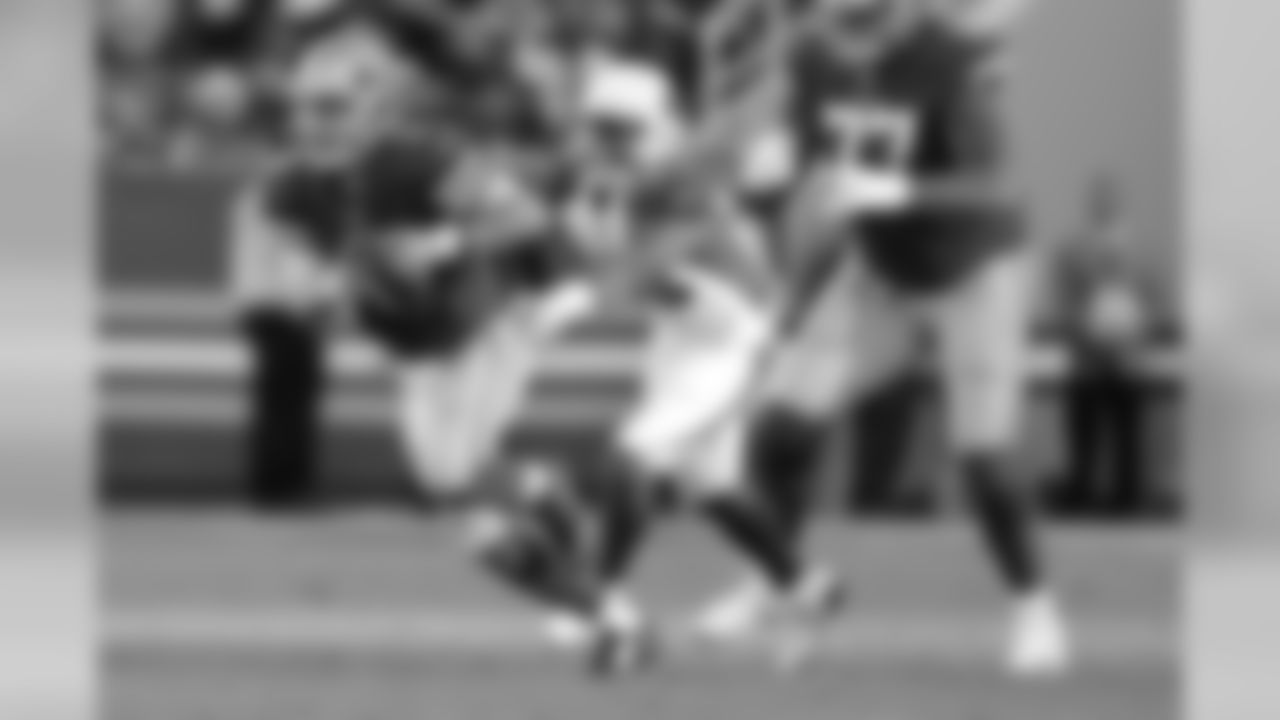 49ers QB C.J. Beathard scrambles out of the pocket