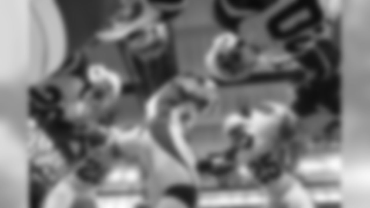 The defensive backs huddle in Detroit