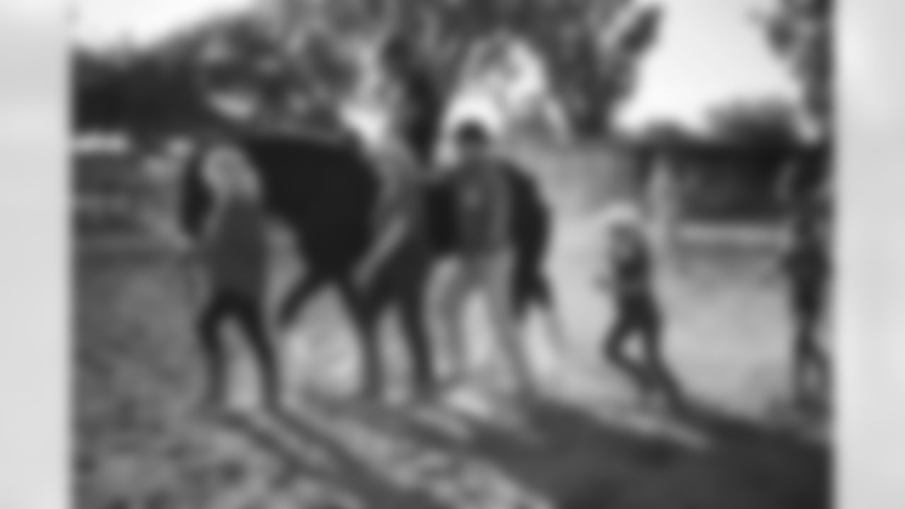 The Arizona Cardinals visit Hunkapi Farms to work with therapy horses and families with ALS on Saturday, May 13, 2023 in Scottsdale, AZ.