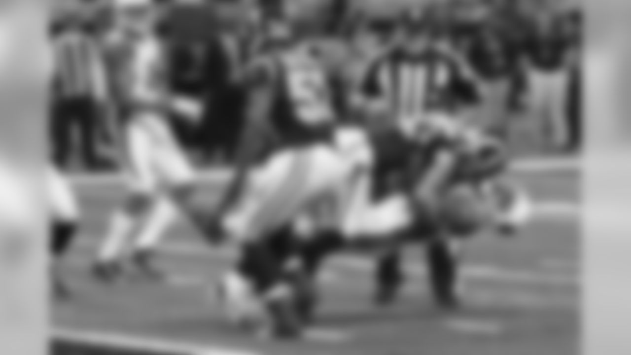 RB Kerwynn Williams is hit hard in St. Louis