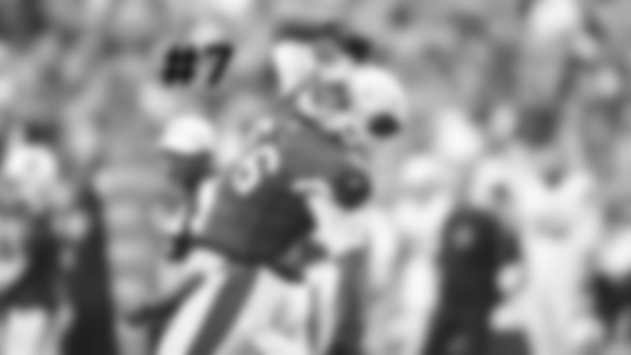 7. DE Zach Moore celebrates a sack