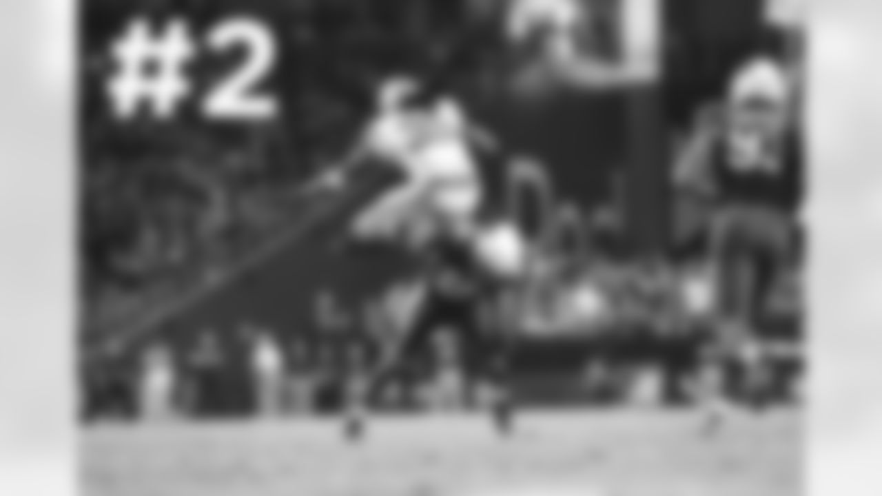 Lions RB Joique Bell hurdles S Rashad Johnson