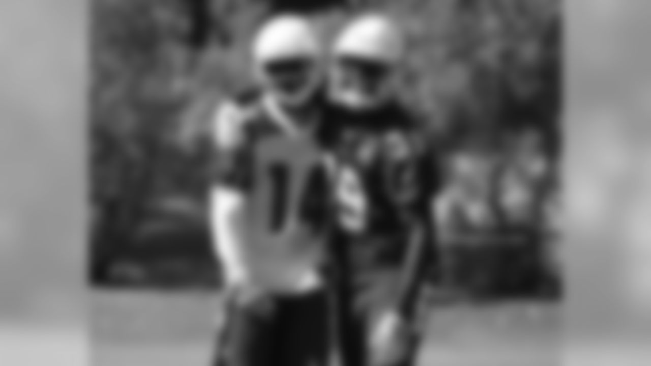 WR J.J. Nelson shares a laugh with CB Elie Bouka after a play