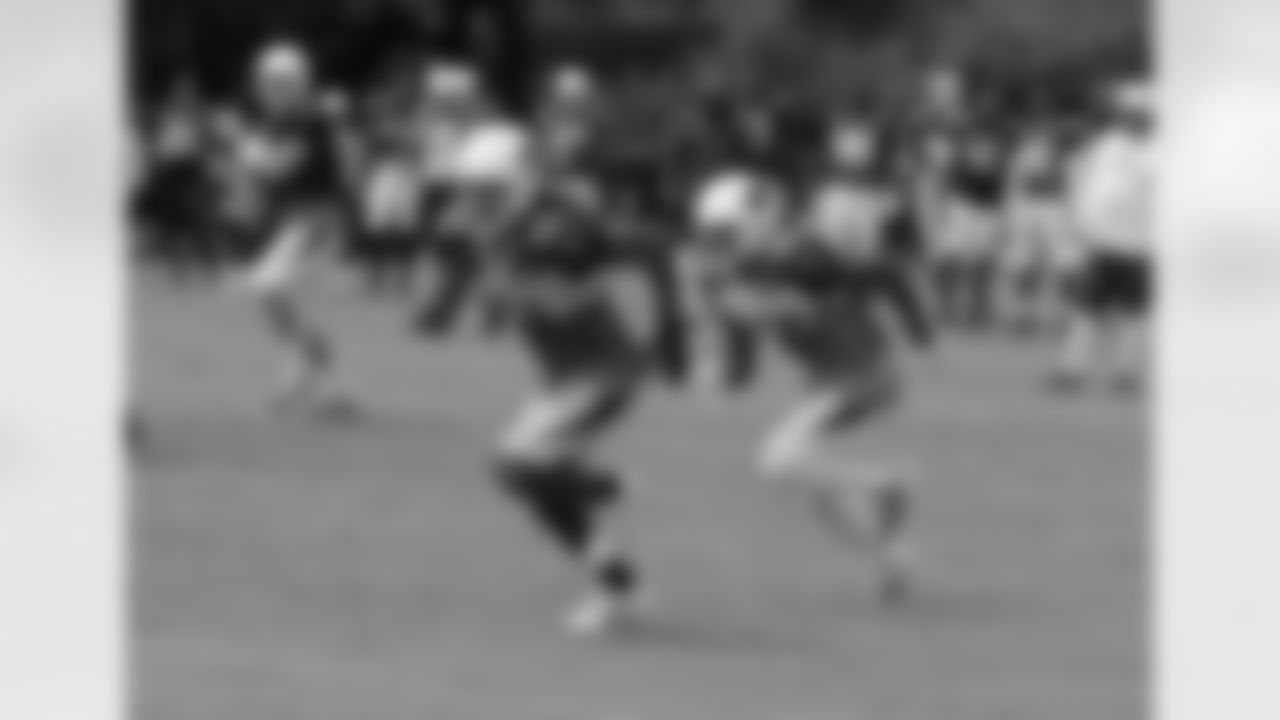 Larry Fitzgerald (11) and Andre Roberts go out for a pass
