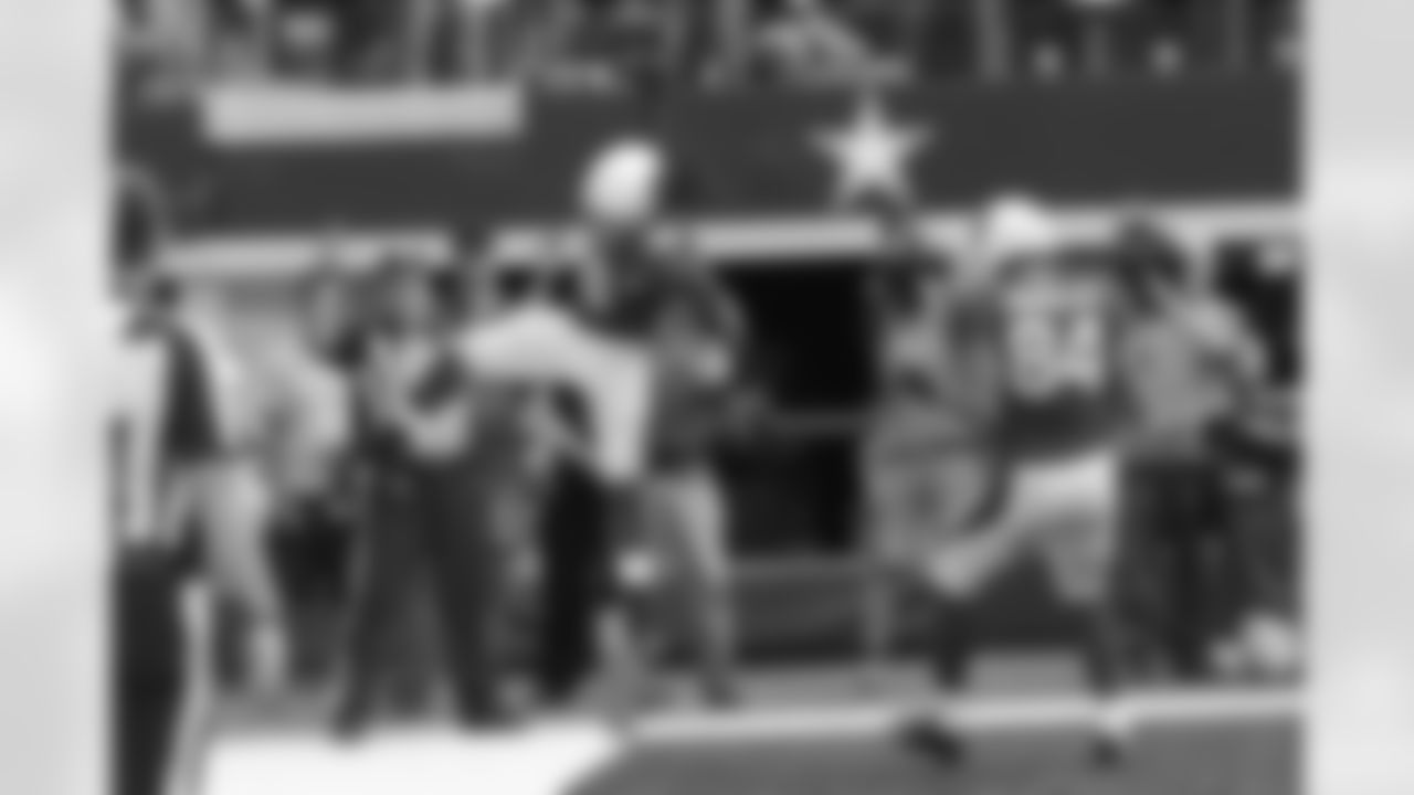 RB Andre Ellington celebrates a touchdown against the Cowboys