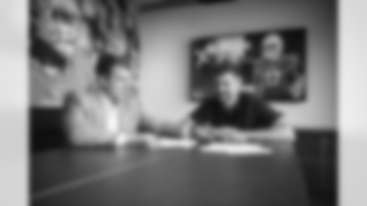 Arizona Cardinals quarterback David Blough (17) signs a contract with the Arizona Cardinals at the Dignity Health Training Facility on Wednesday, March 22, 2023.