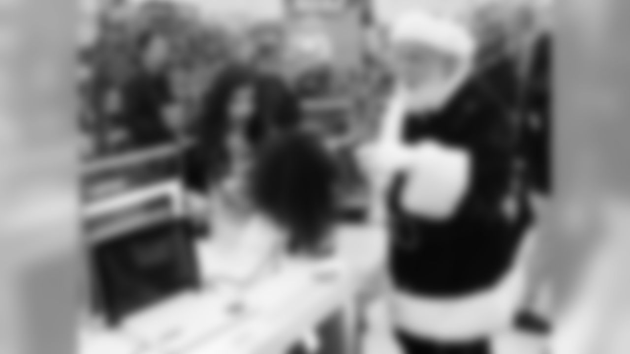 Shopping with Santa and a cheerleader