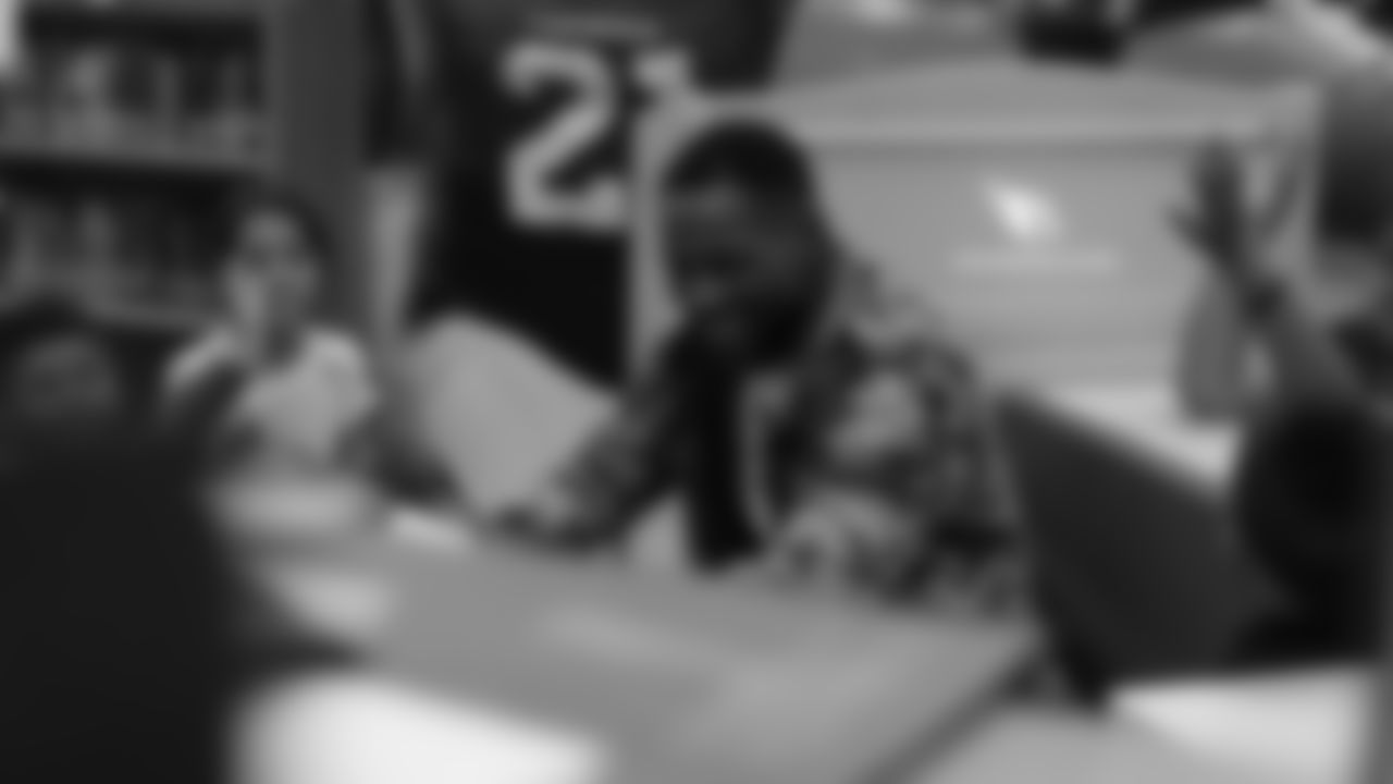 CB Patrick Peterson creates a reading room at David Crockett Elementary where kids can learn comfortably