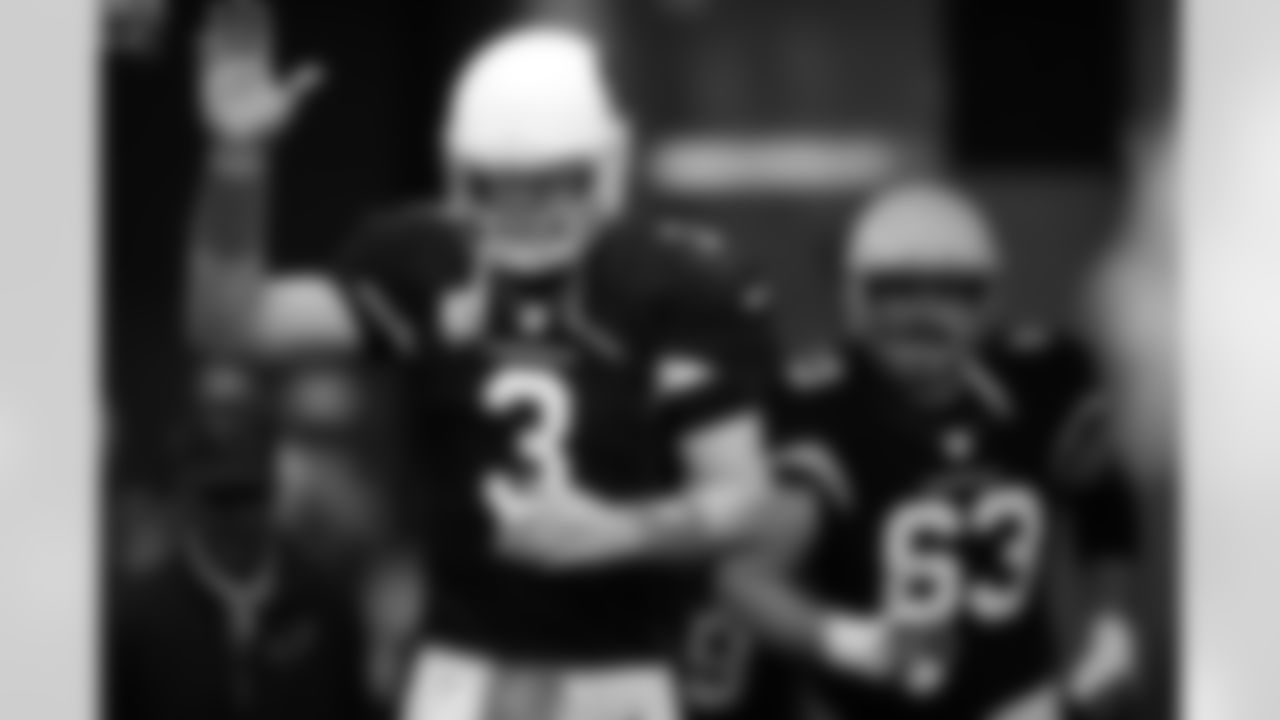 QB Carson Palmer with a wave to acknowledge the cheers