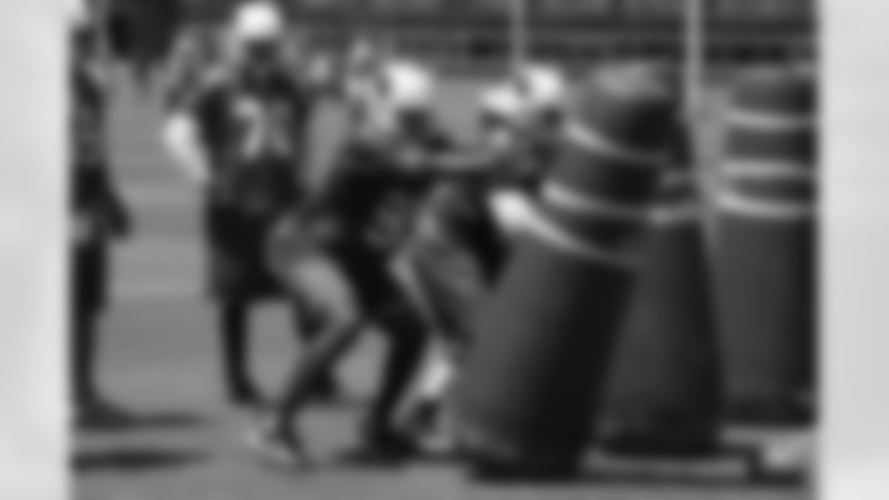 Defensive end Calais Campbell hits the bag