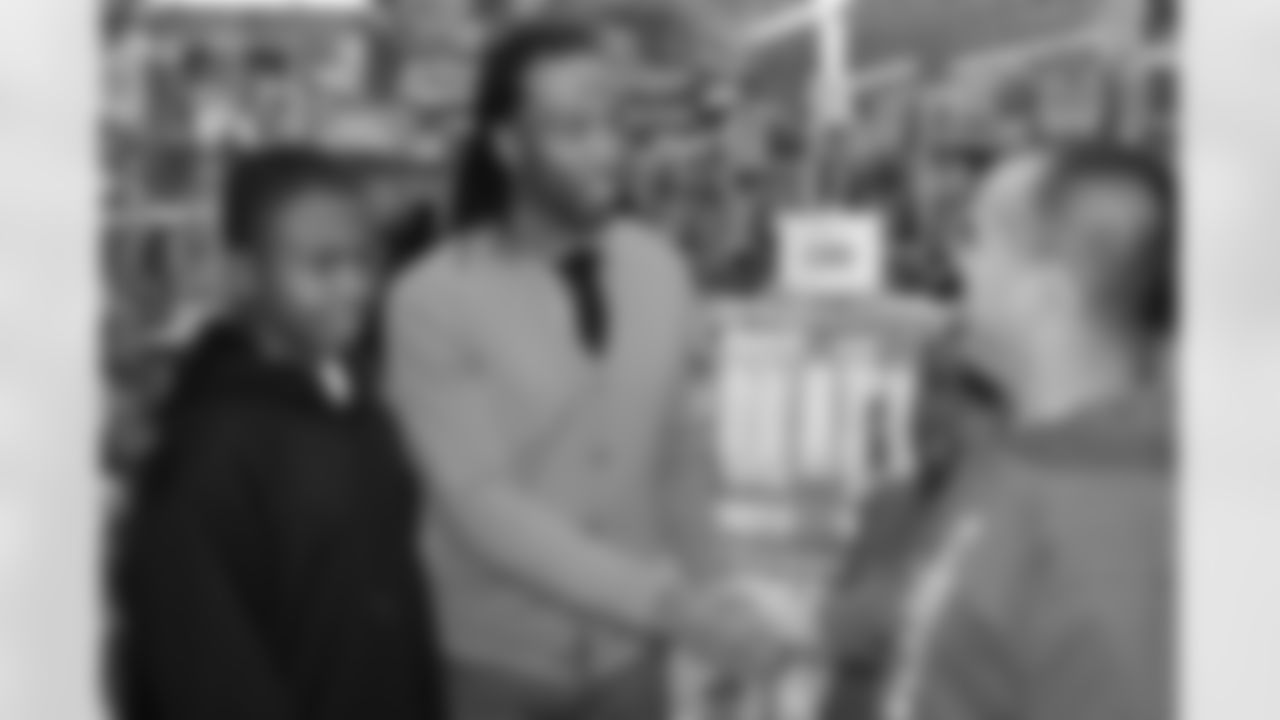 Larry Fitzgerald greets a fan