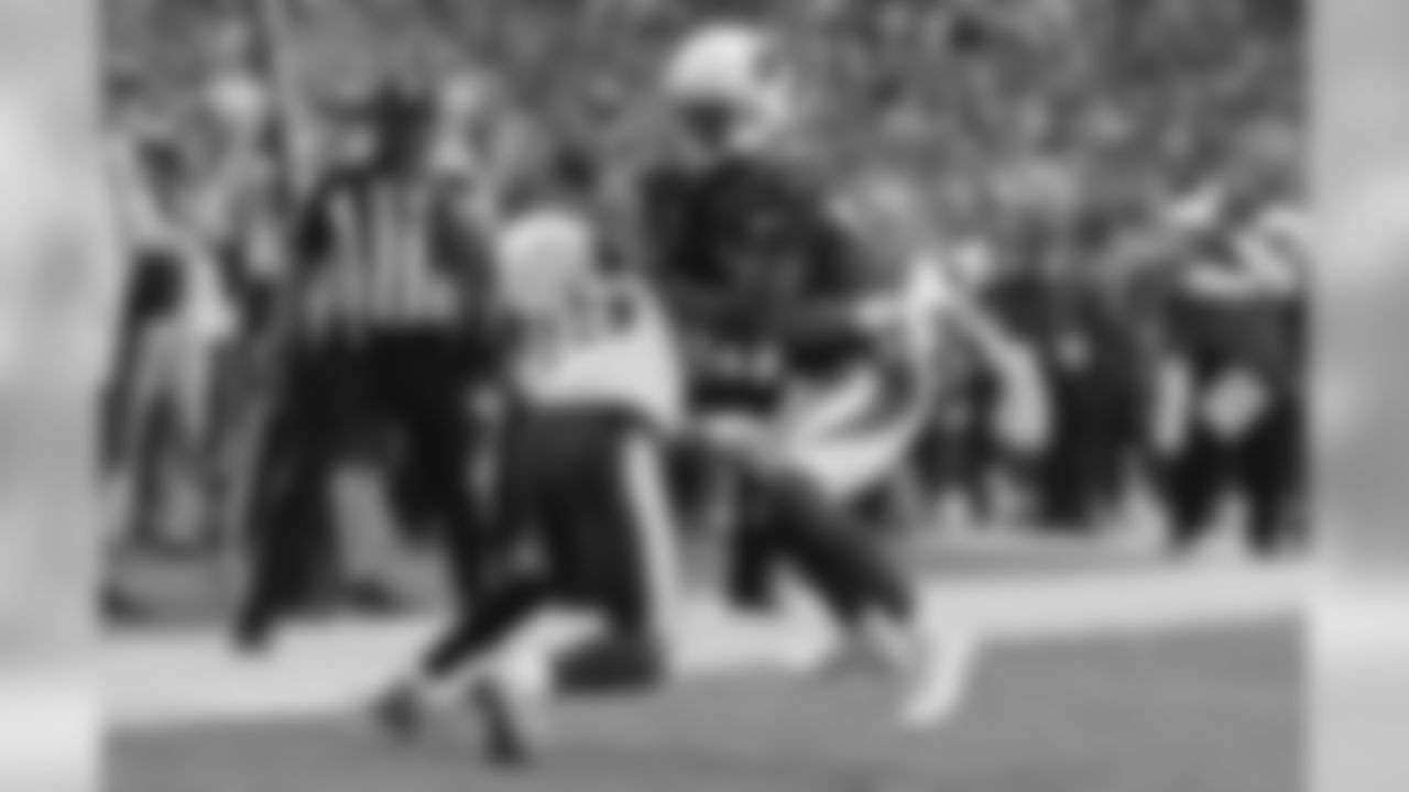 Cardinals WR Jaron Brown gets tackled