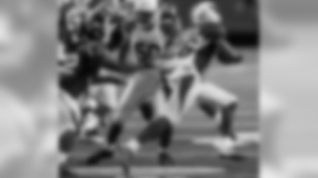 S Rashad Johnson returns an interception for a touchdown against the Falcons