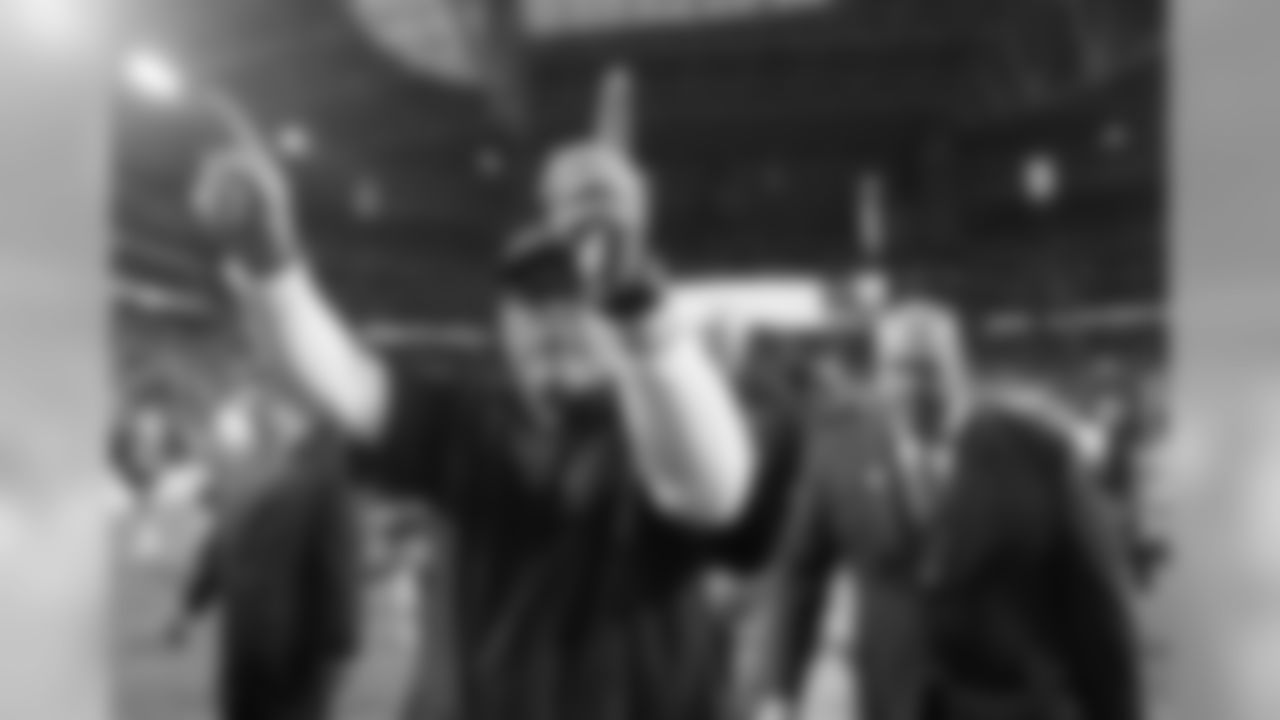 Arians points to the crowd after the playoff win over the Packers