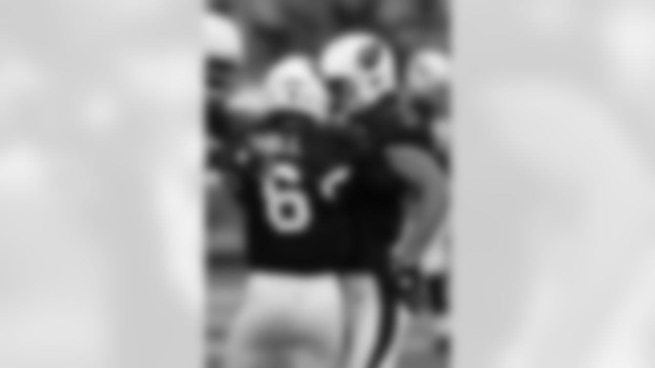 Hall is congratulated after throwing his first career TD pass