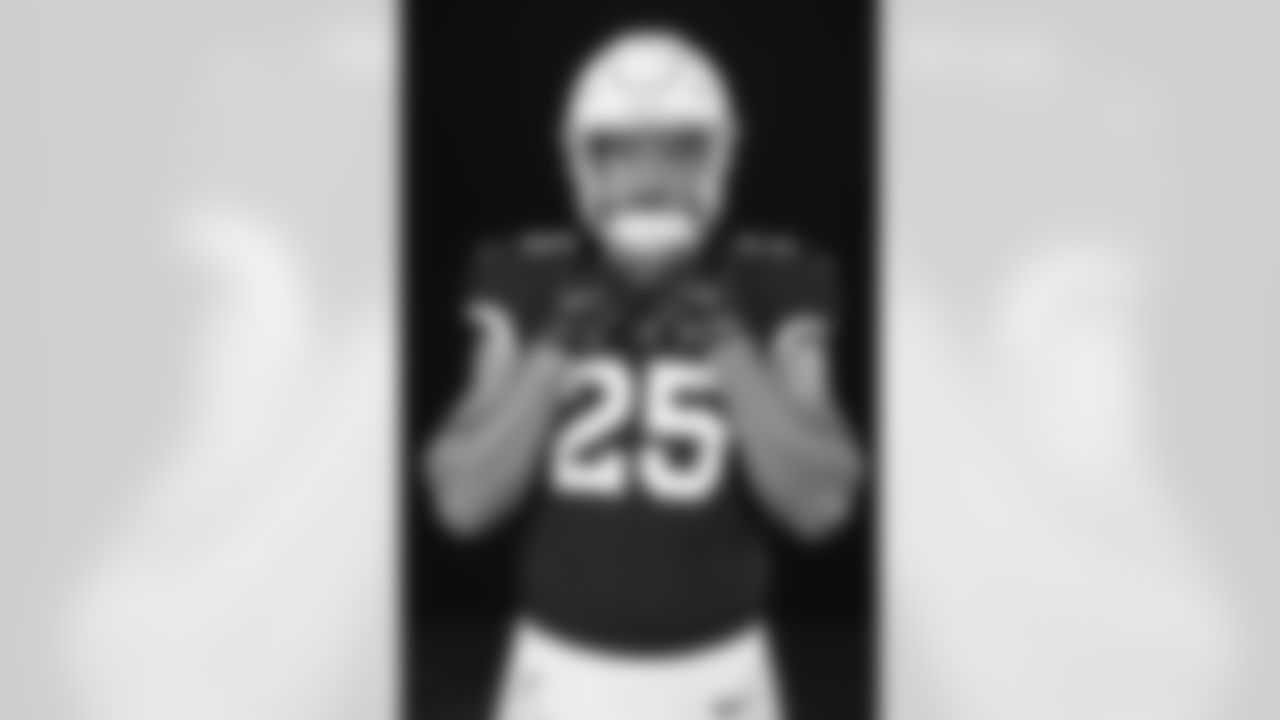 Arizona Cardinals linebacker Zaven Collins (25) poses for a photo during Cardinals Media Day on Monday, June 13, 2022 in Tempe, AZ.