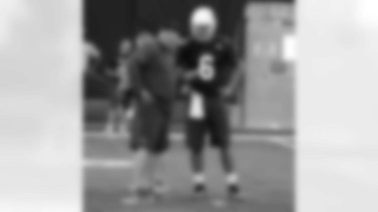 QB Logan Thomas with coach Bruce Arians