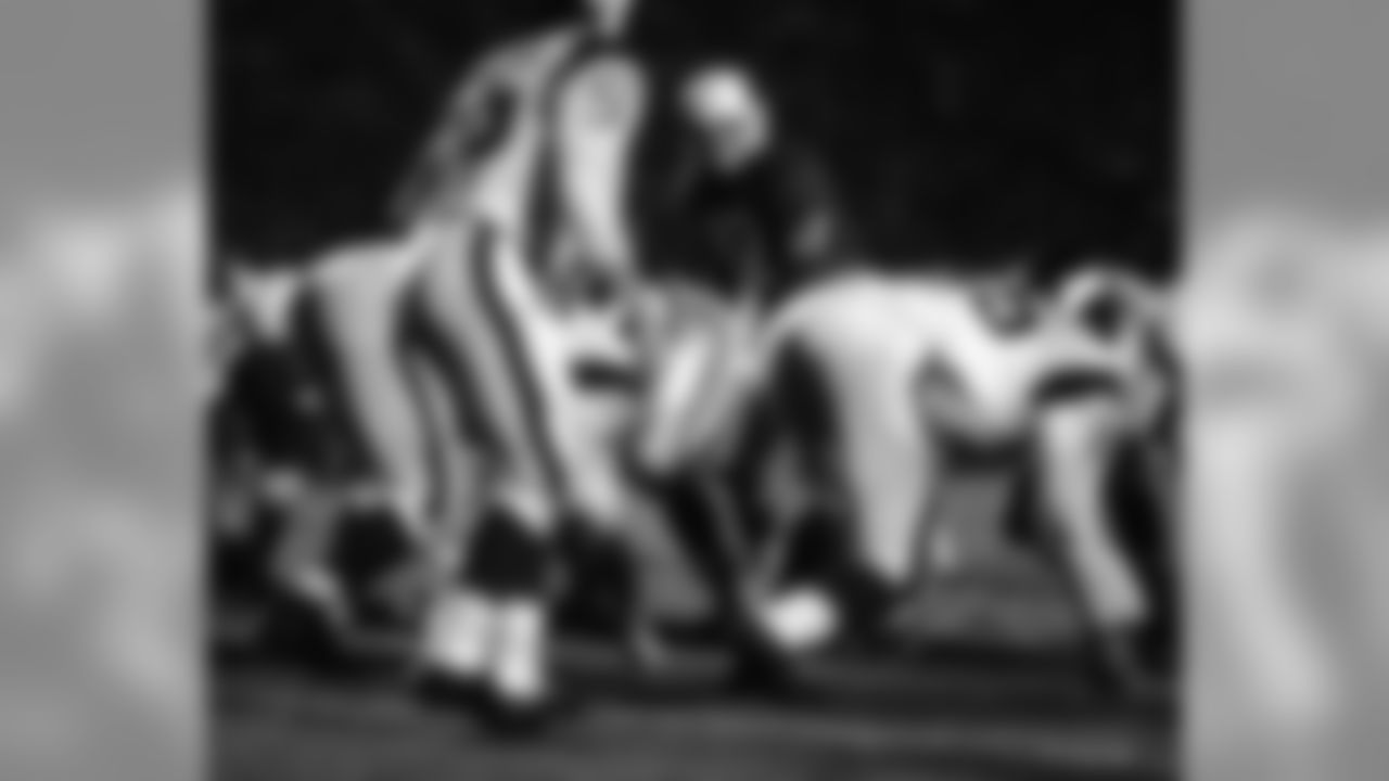 1967: QB Charley Johnson at the line of scrimmage