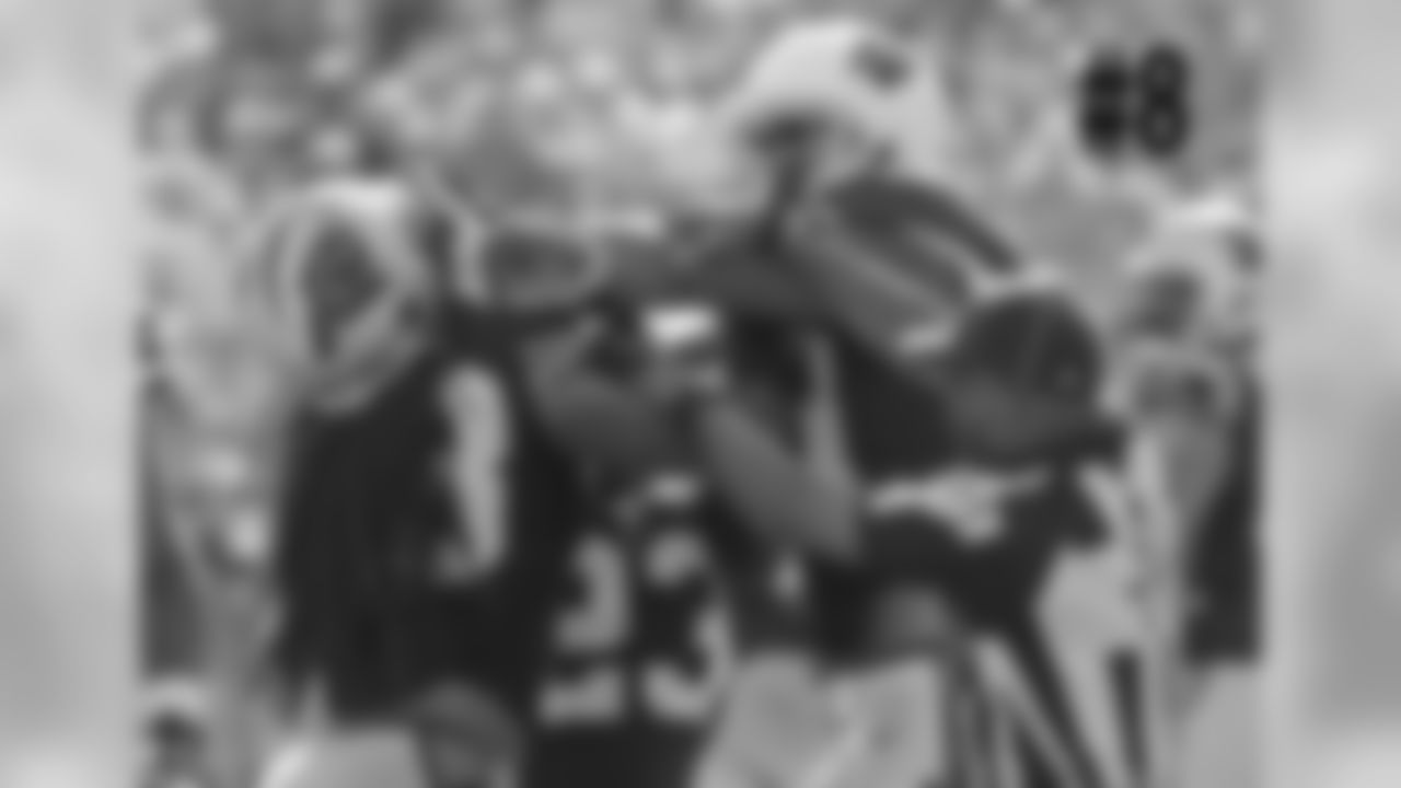 TE Jermaine Gresham mixes it up with Panthers S Tre Boston
