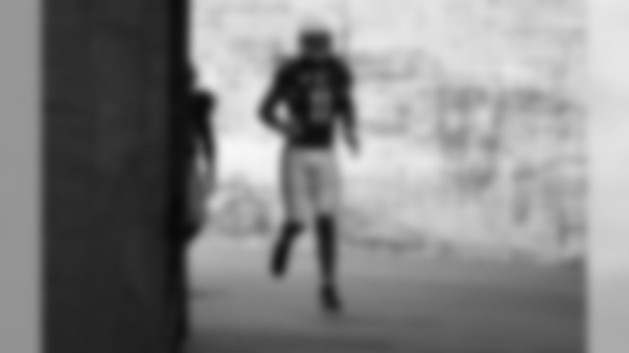 WR Larry Fitzgerald runs onto the field before the game