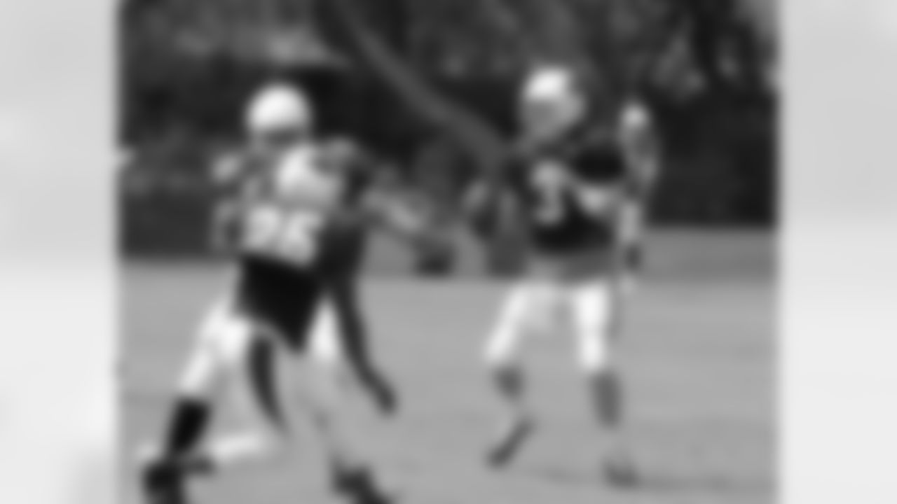 QB Carson Palmer scrambles looking for an open receiver