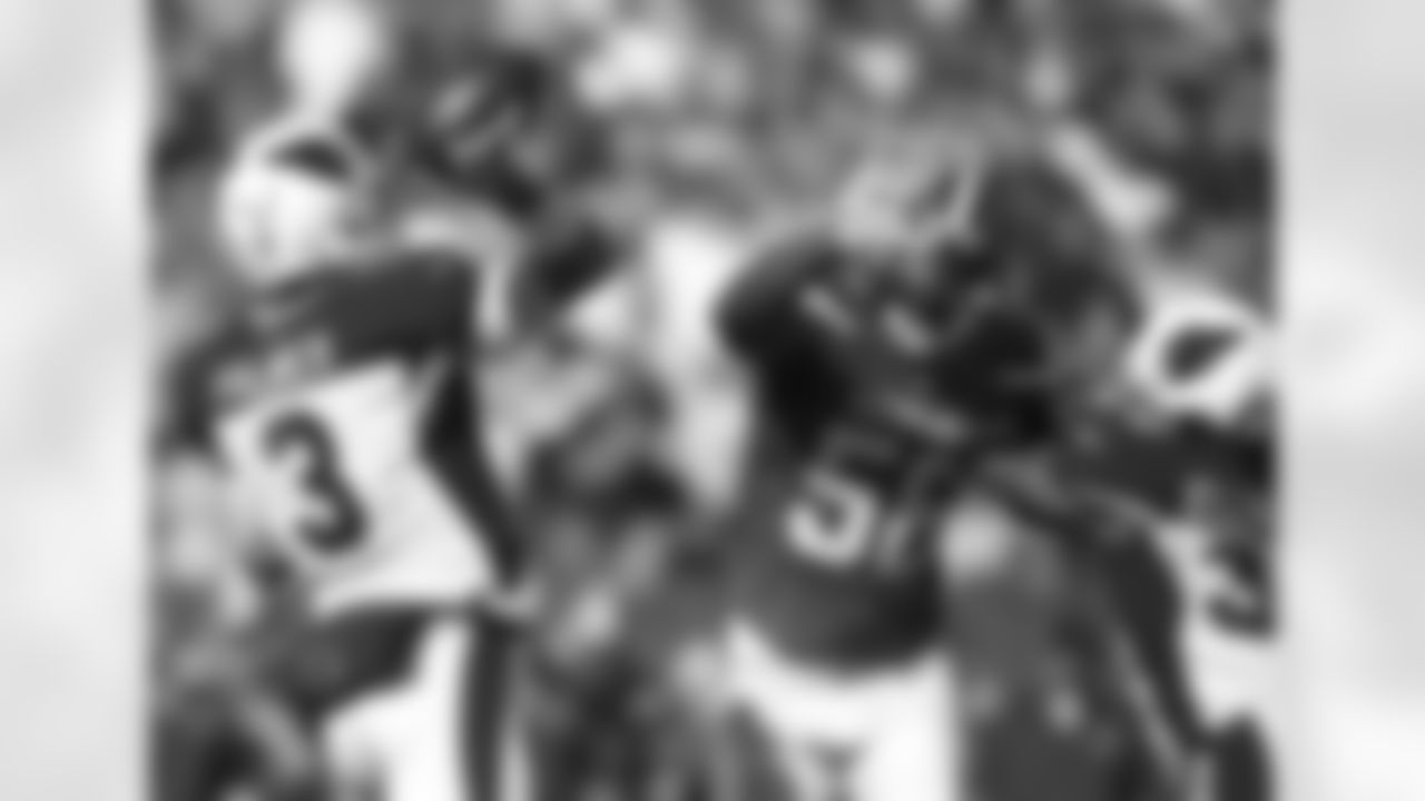 QB Carson Palmer throws a pass in Cleveland