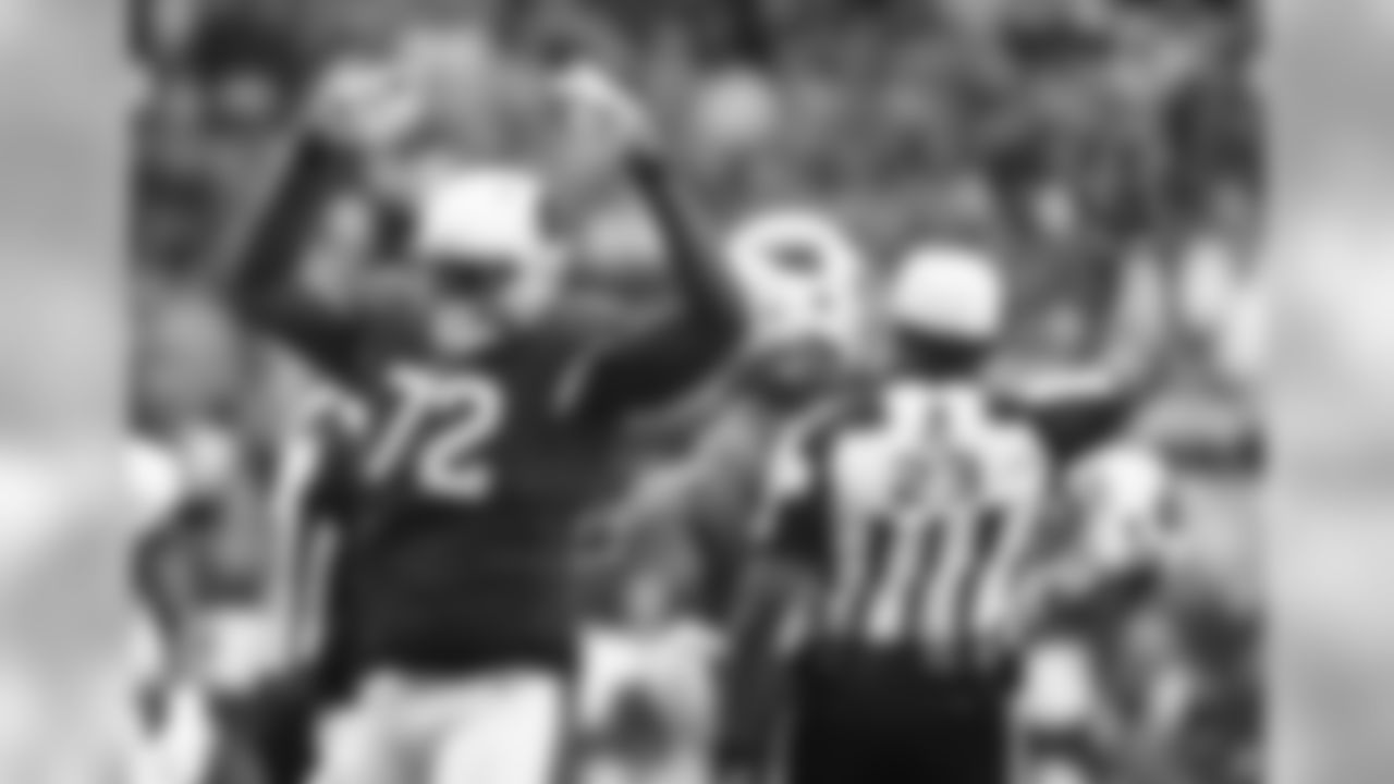 DL Olsen Pierre celebrates his sack