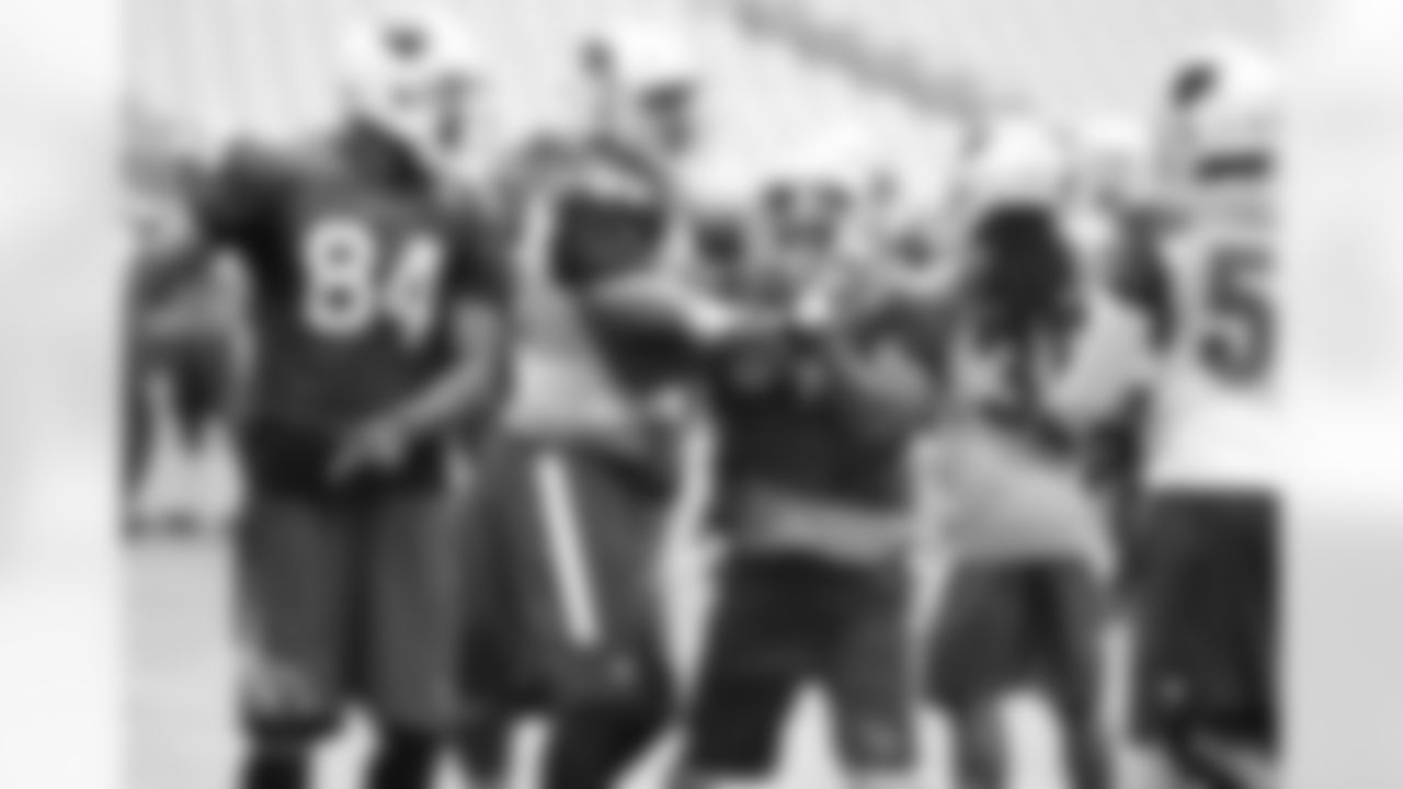 DT Calais Campbell stops RB David Johnson on a running play