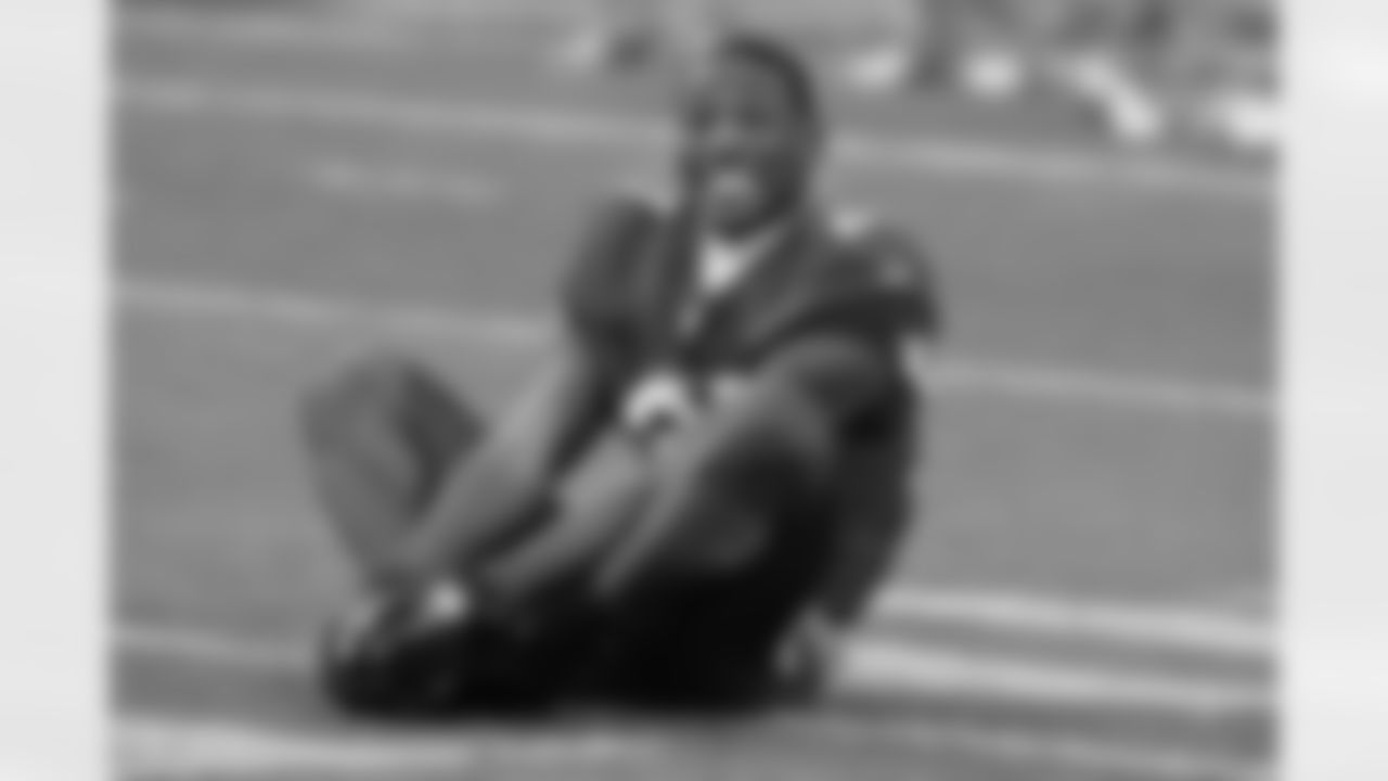 A happy Peterson stretches