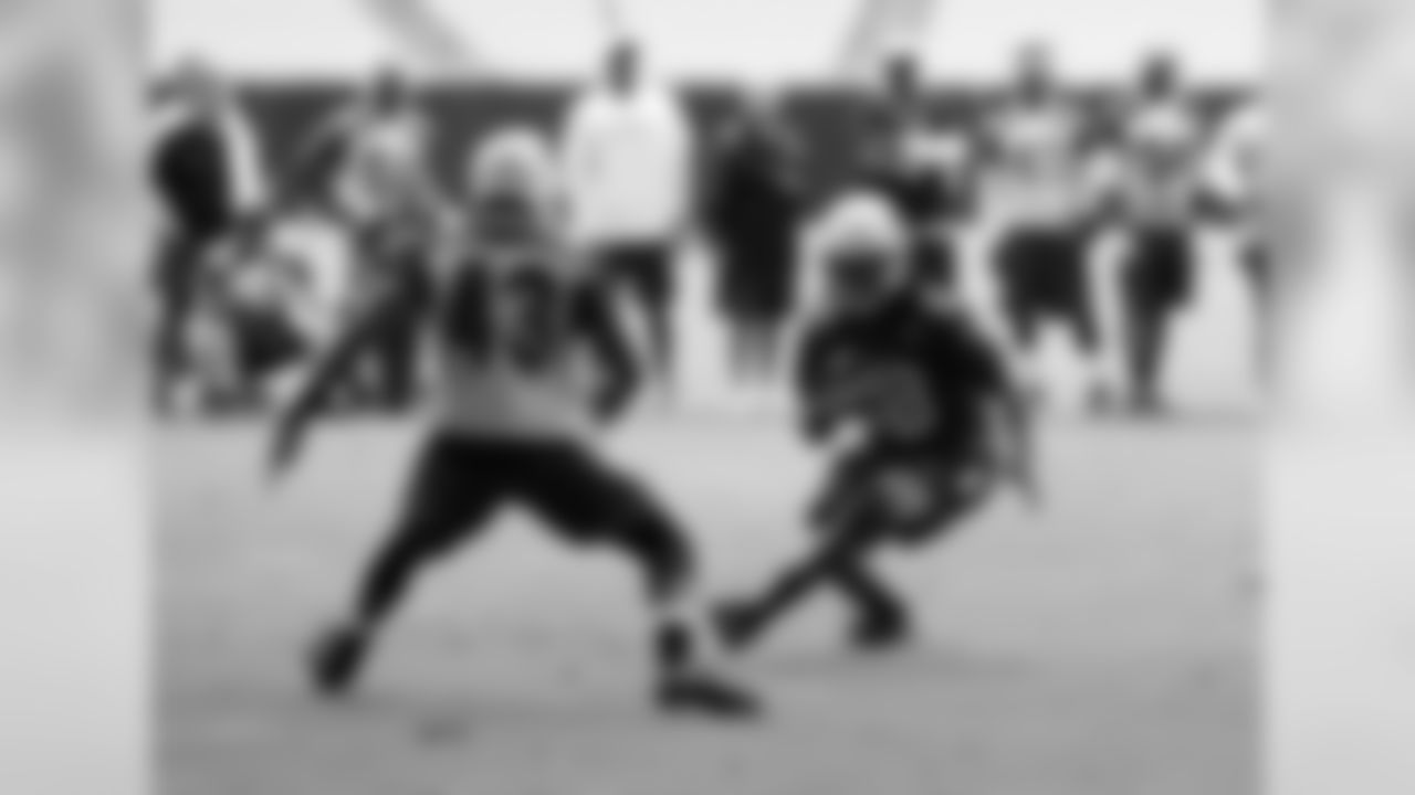 RB Andre Ellington looks to avoid the tackle