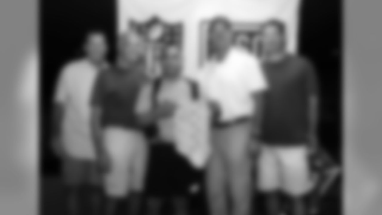On the final day, the coaches pose with specialist Mario Quintanilla