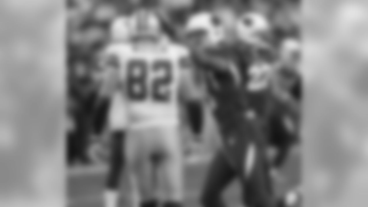 2010: Cardinals WR Larry Fitzgerald (right) with Cowboys TE Jason Witten