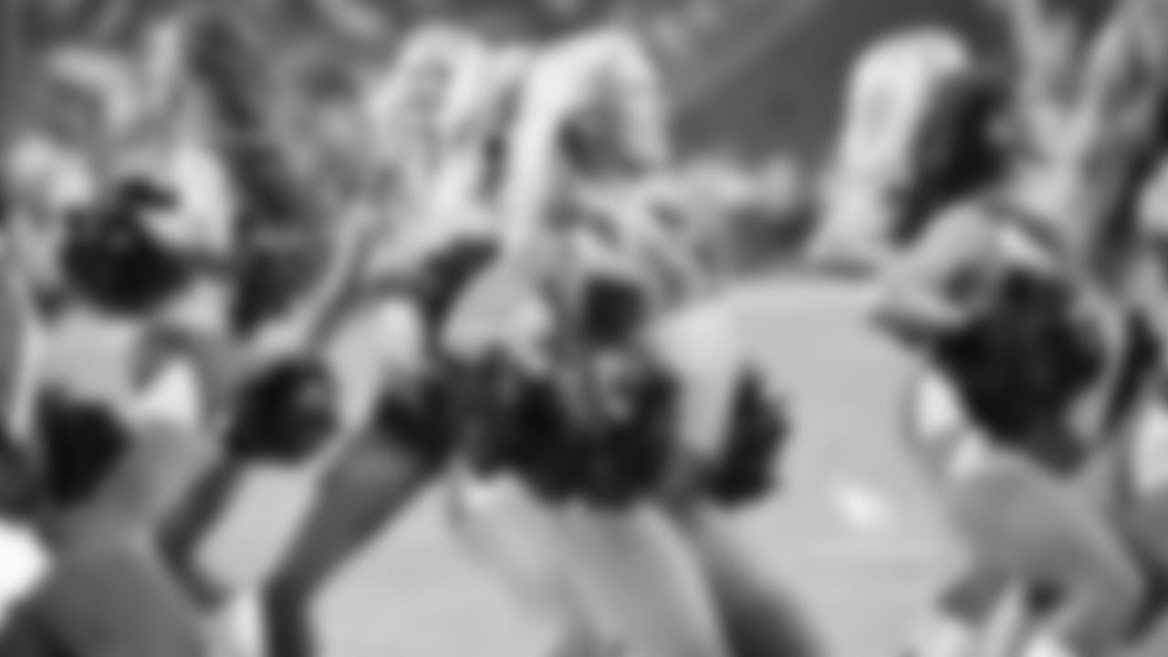 Images of Cardinals cheerleader Davis from the 2018 season