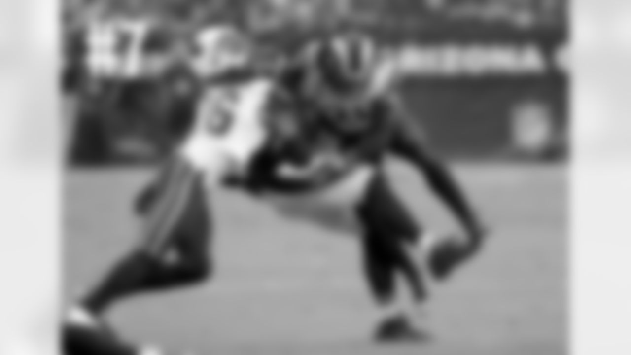 TE Jermaine Gresham gets sandwiched while trying to hang on to a pass