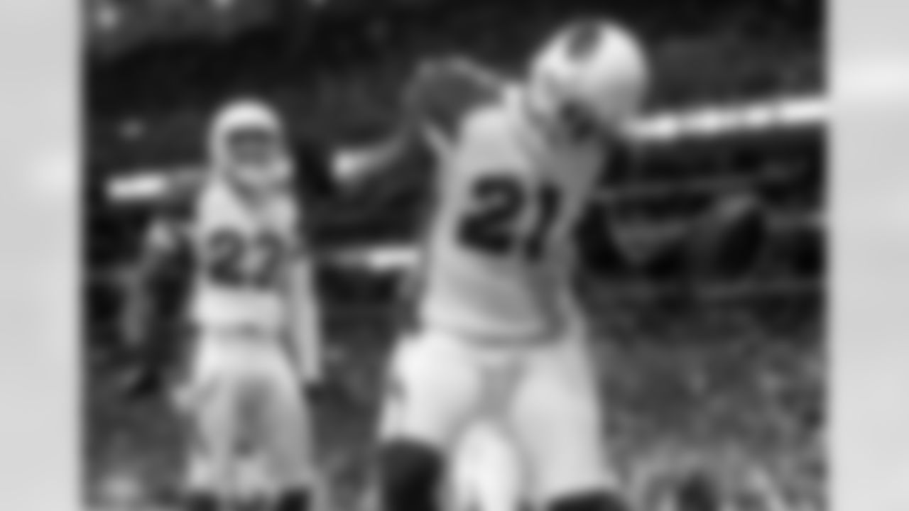 Peterson celebrating a punt return for a touchdown
