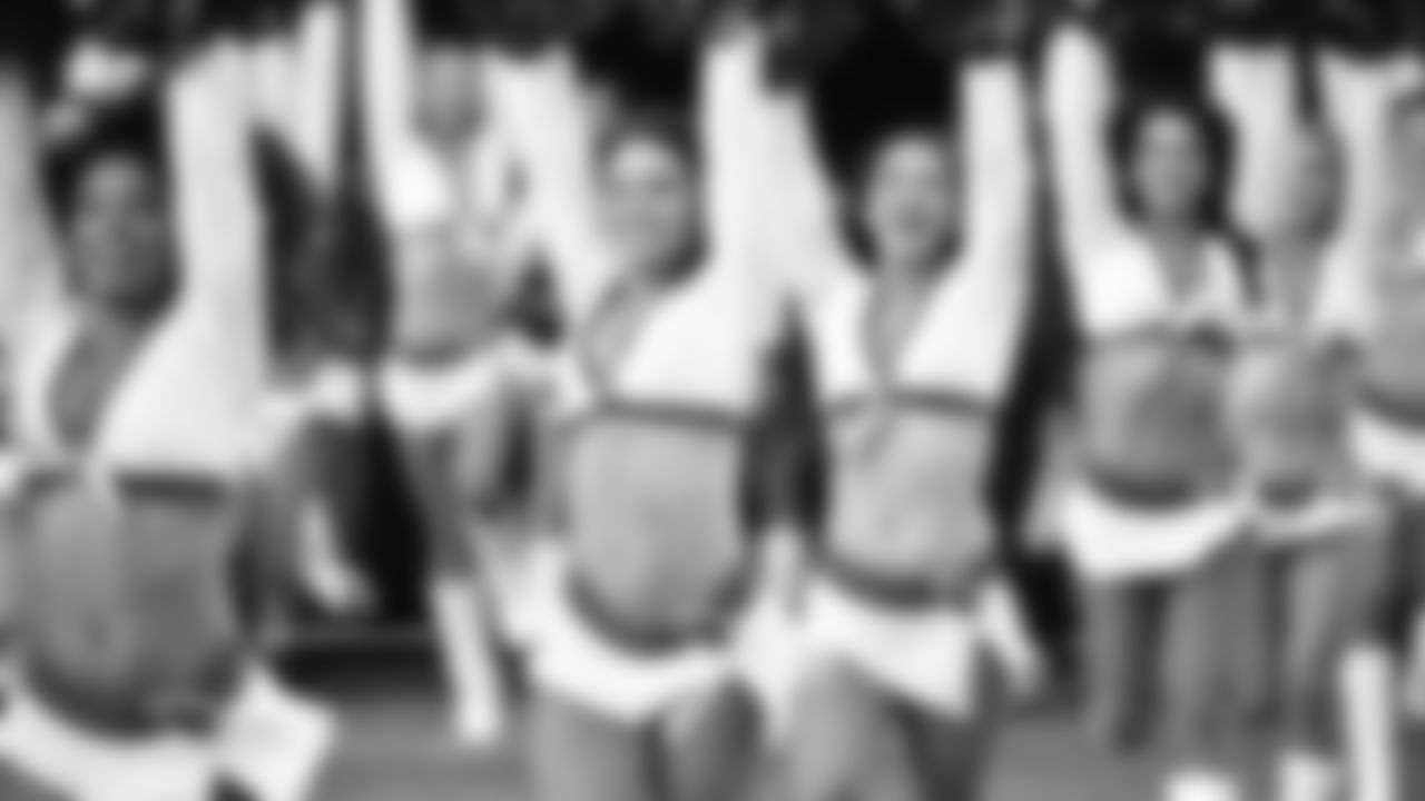 Images of Cardinals cheerleader Kayla during the 2018 season