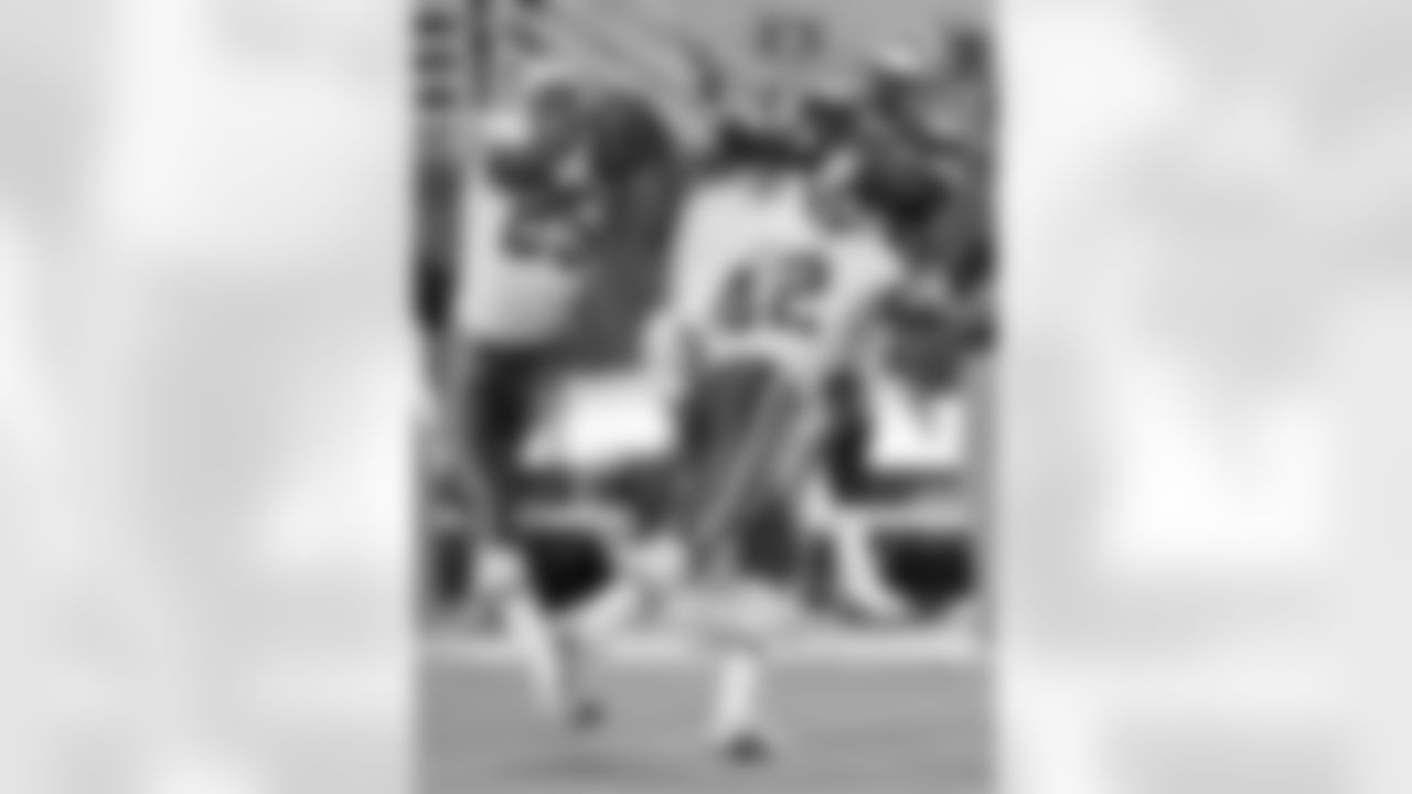 2000: CB Corey Chavous picks off a pass intended for Seattle WR Fabien Bownes