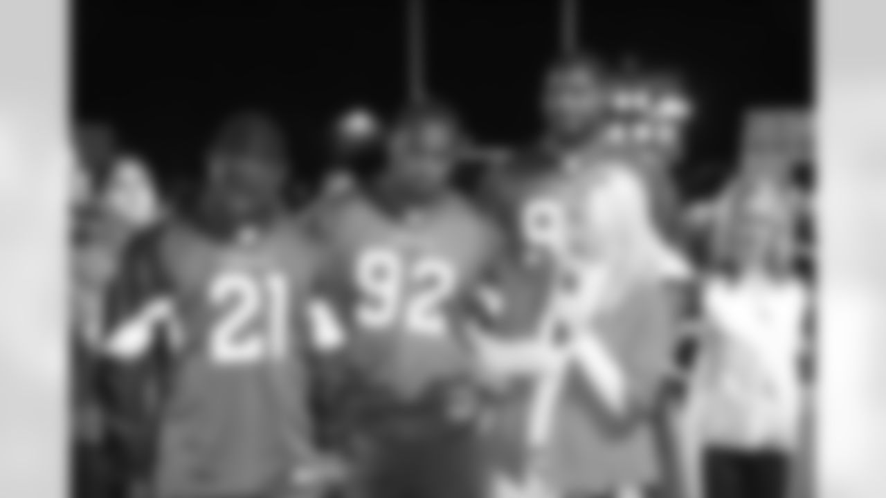 Patrick Peterson, Dan Williams and Calais Campbell with the coach