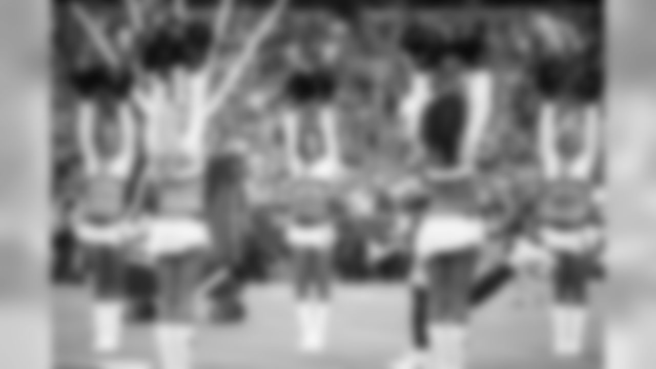 Images of the Cardinals cheerleaders from halftime and other moments at the home opener