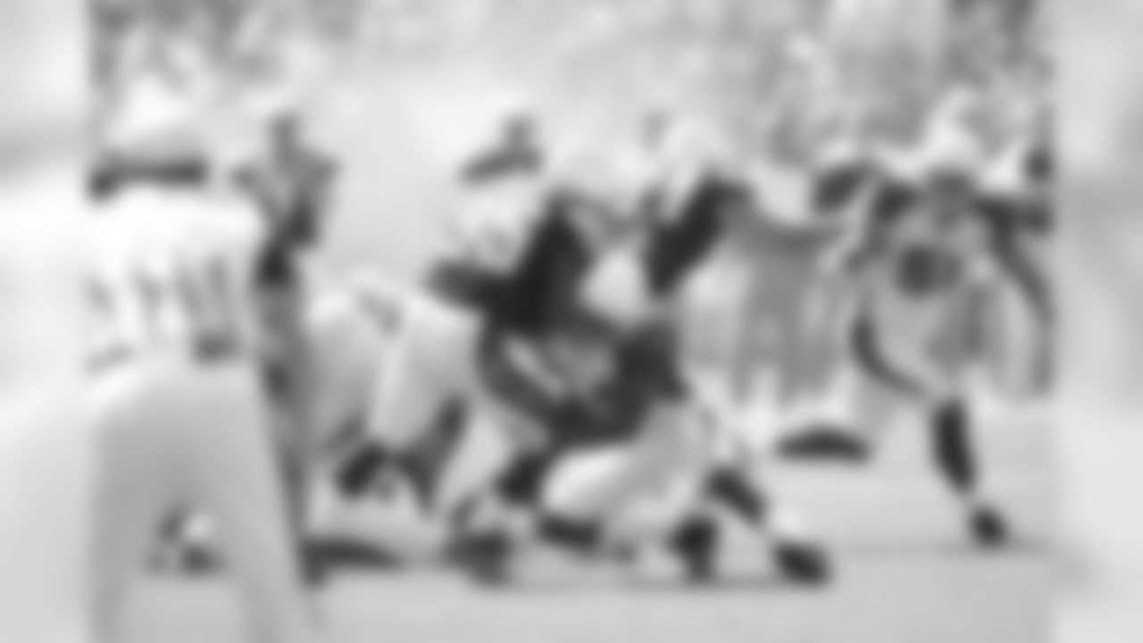 Adrian Wilson with the tackle