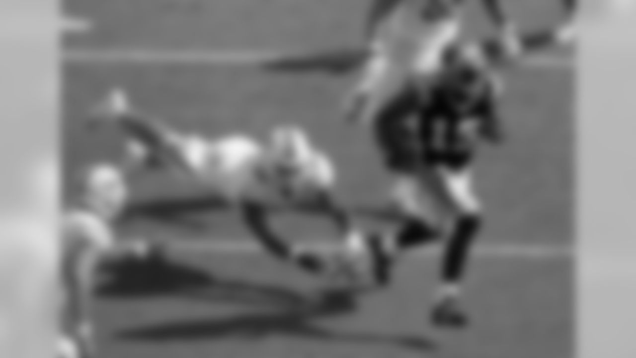 Ginn finds some space against the Dolphins in 2013.