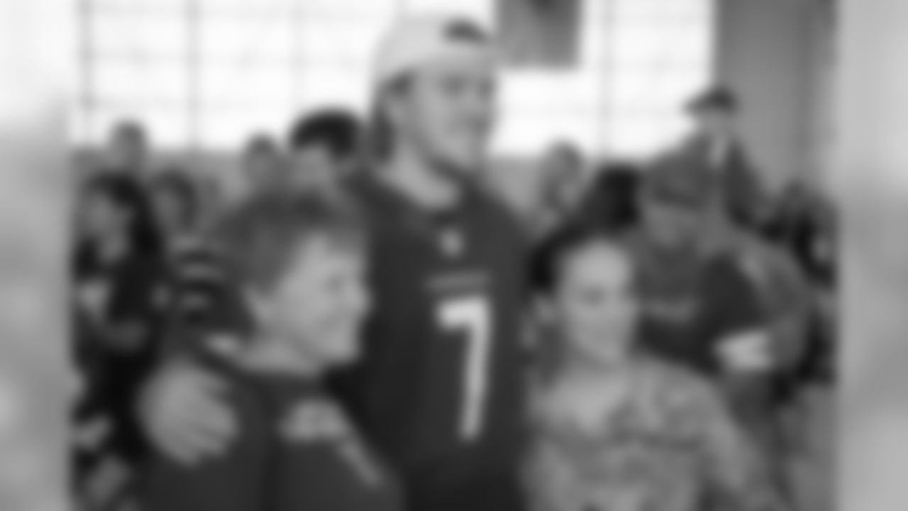K Chandler Catanzaro takes a photo with fans