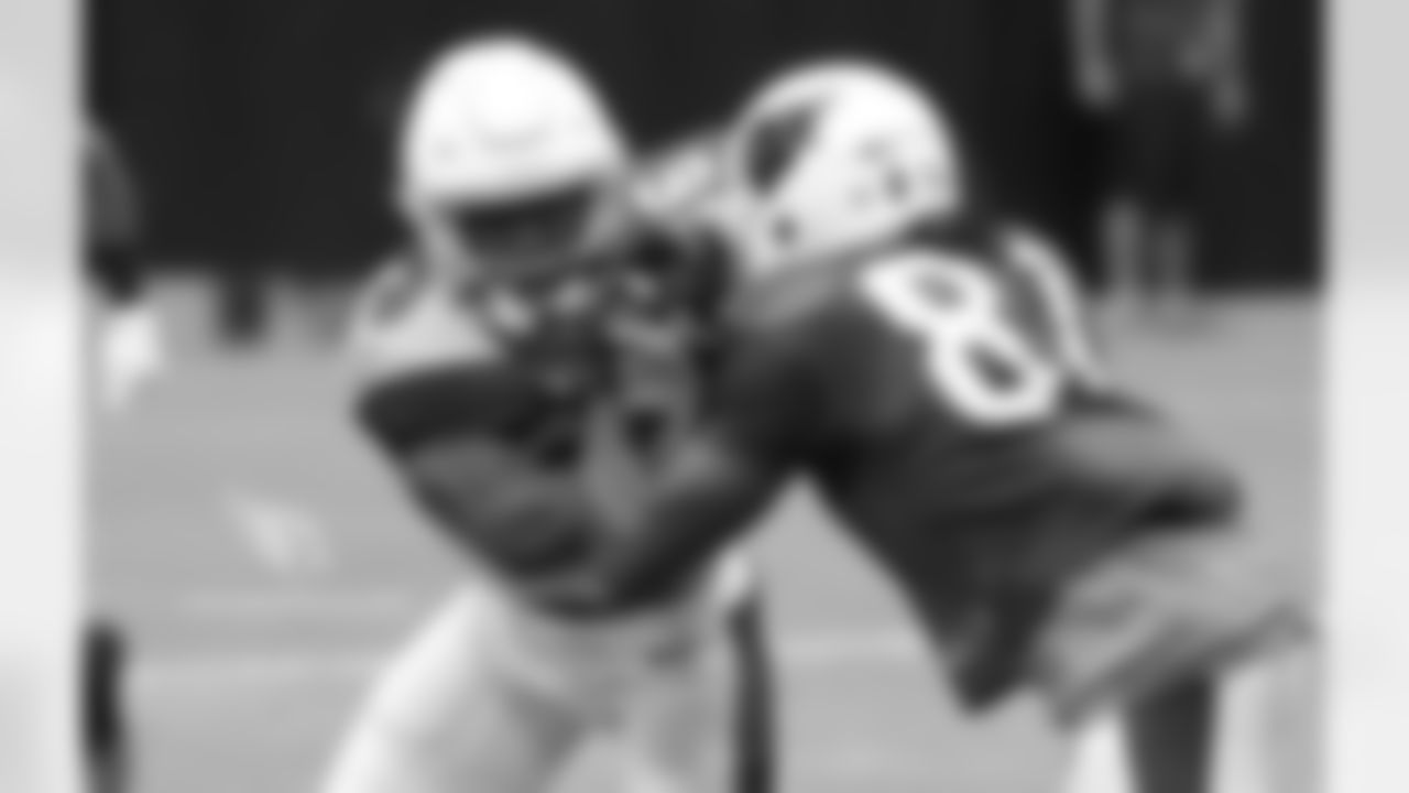 Day 13: WR Chris Hubert (right) blocks S Budda Baker (left)
