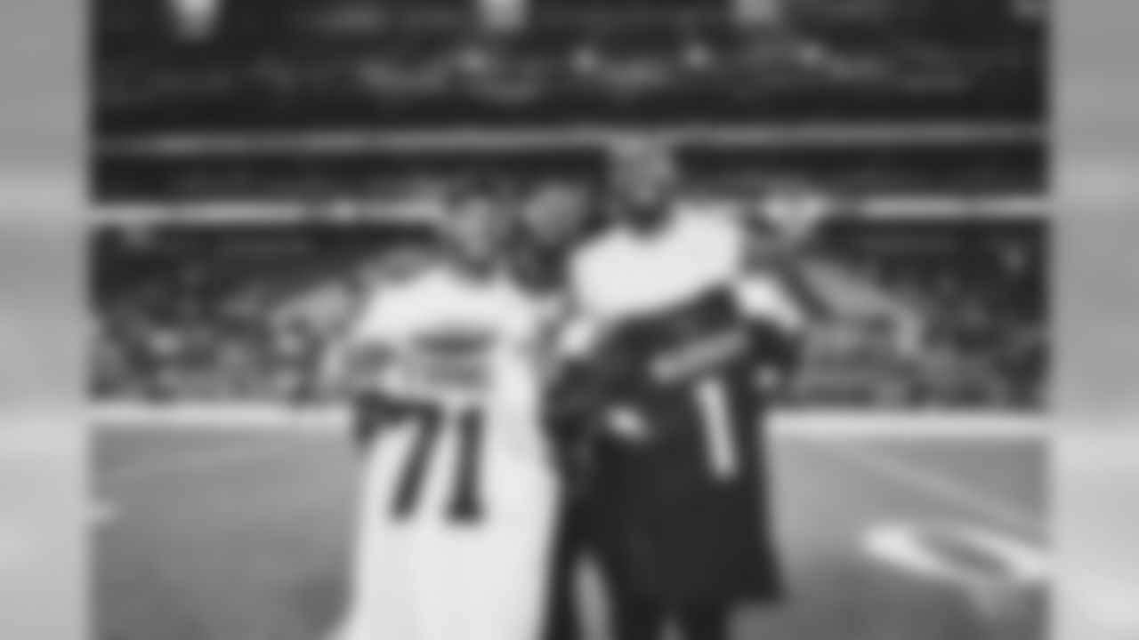 QB Kyler Murray (left) and Rams T Bobby Evans
