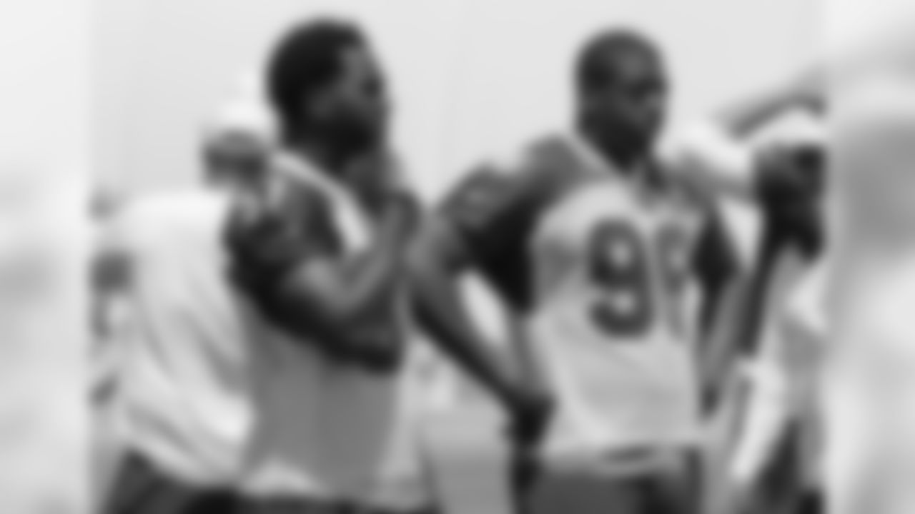 LB Alex Okafor (57) and DE Kareem Martin