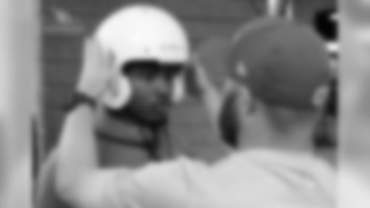 CB Sojourn Shelton gets fitted for a helmet on his first day