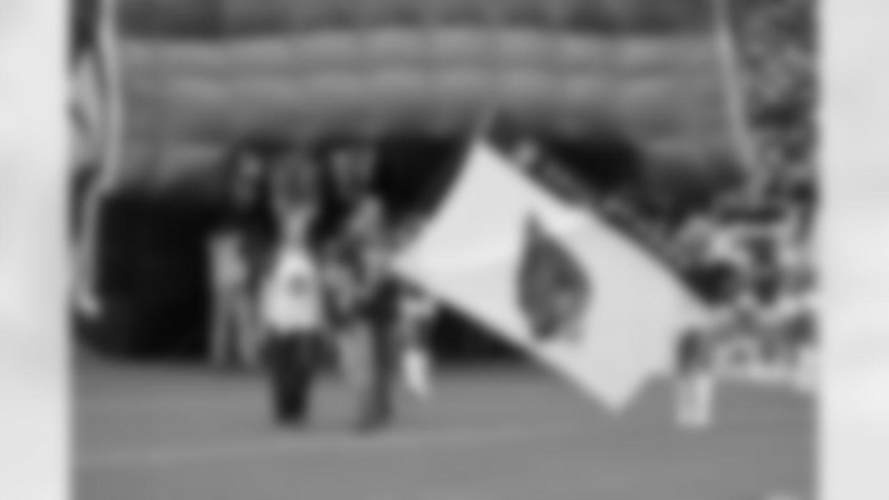 Taylor hoisting the flag