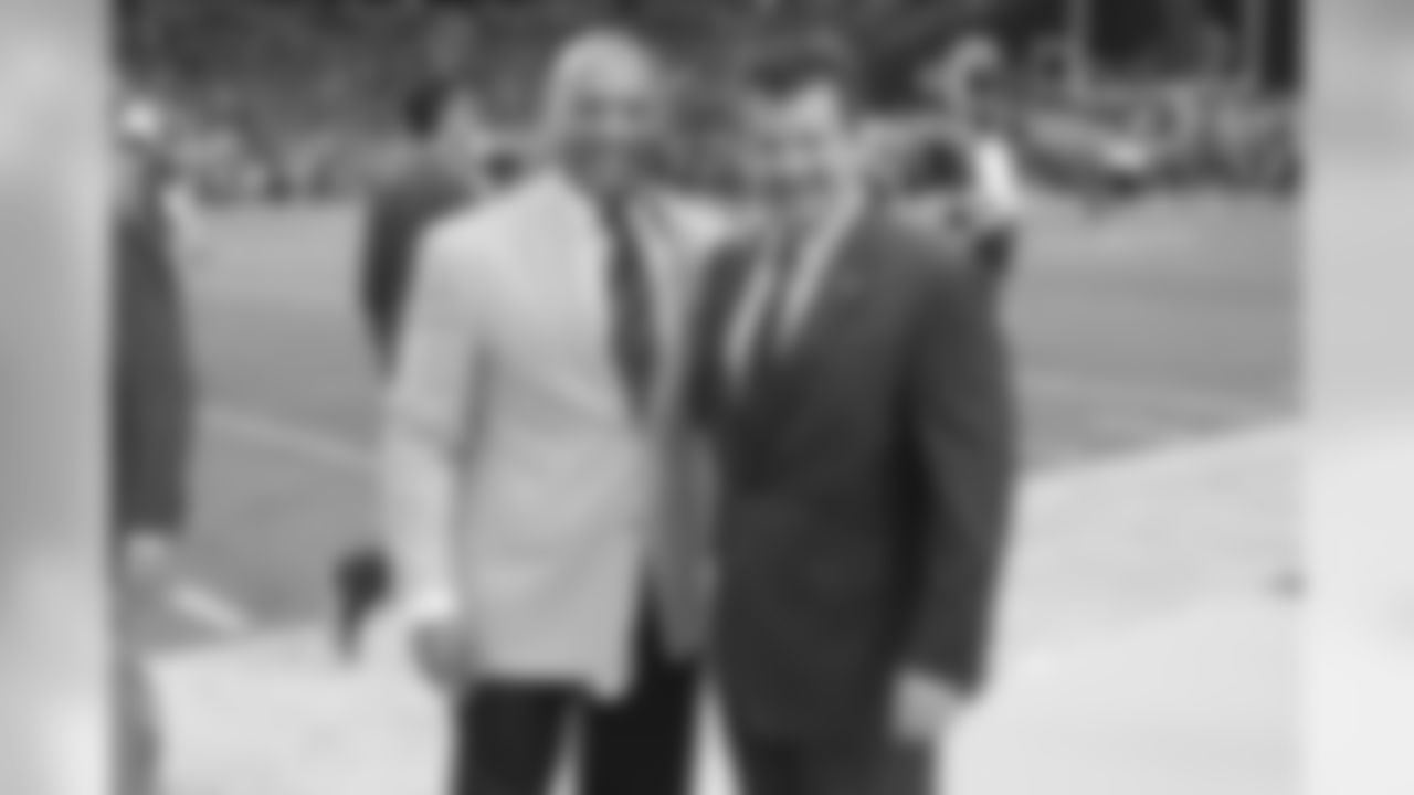 Aeneas Williams with team president Michael Bidwill before the game